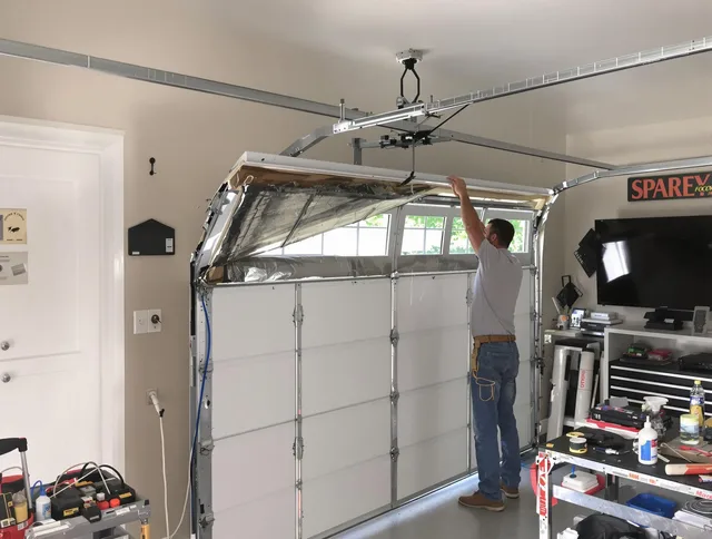Garage door section replacement by Cypress Garage Door Repair in Cypress