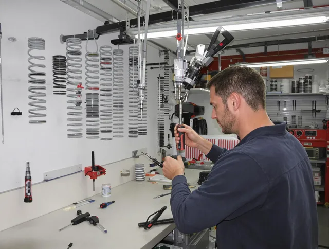 Cypress Garage Door Repair safety certified technician performing precision spring replacement in Cypress