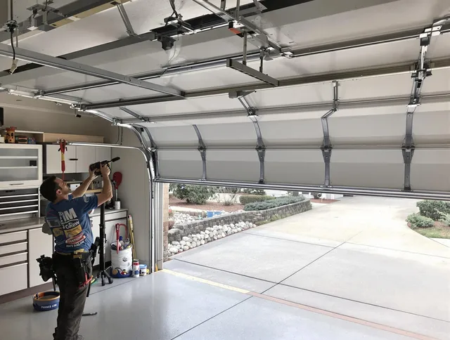 Garage door track repair service by Cypress Garage Door Repair in Cypress